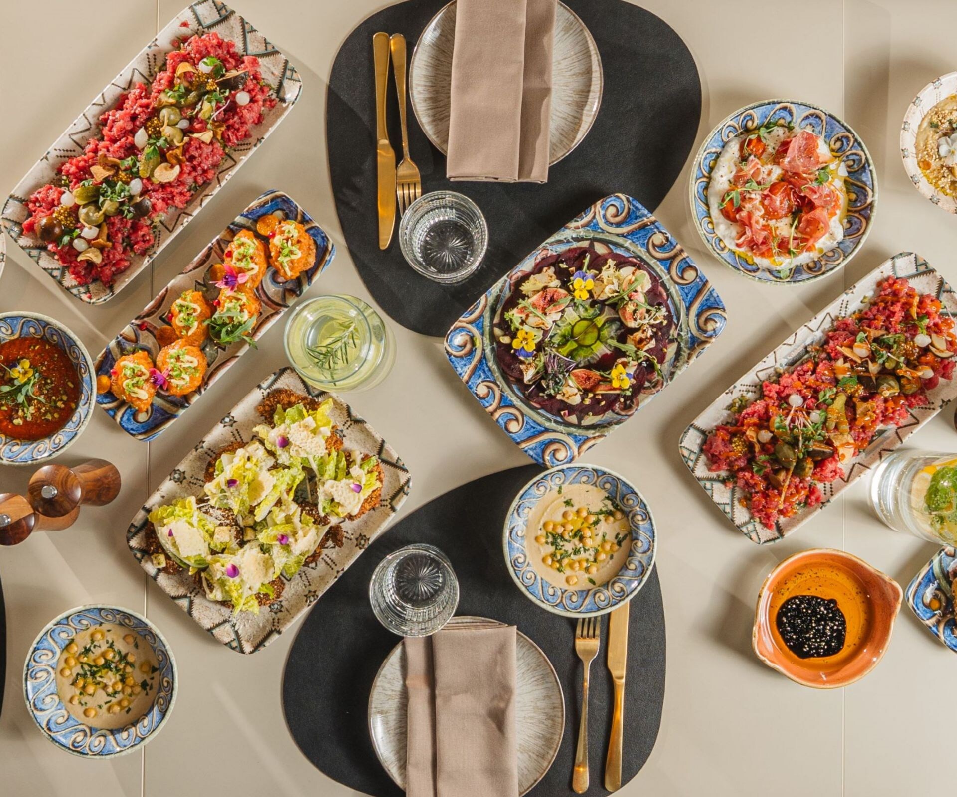 A table full of beautiful Mediterranean dishes