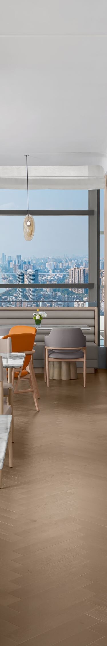 Bright modern dining area with tables and windows
