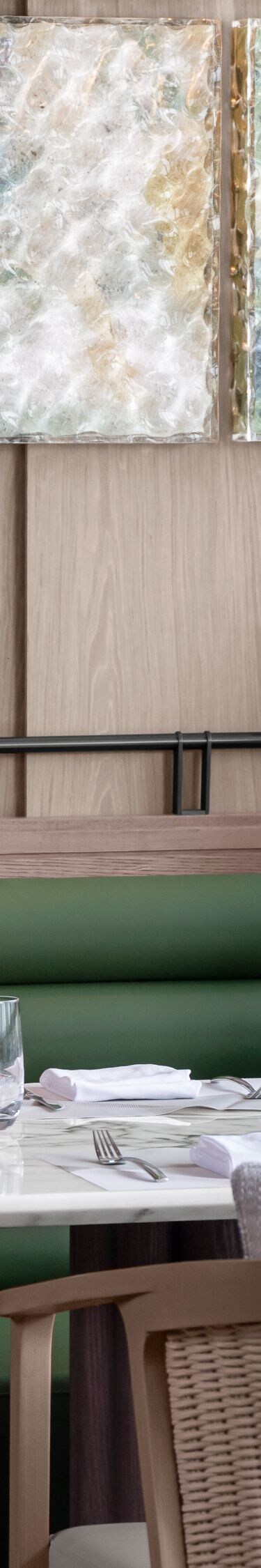 Woman eating breakfast in a restaurant