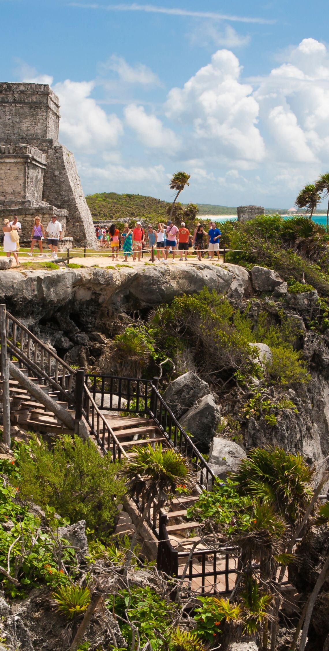 Mexican ruins on top of cliff overlooking beach