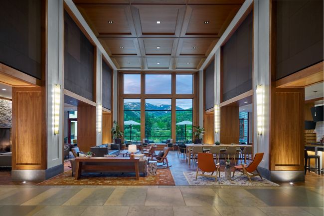 Lobby with seating area and mountain view