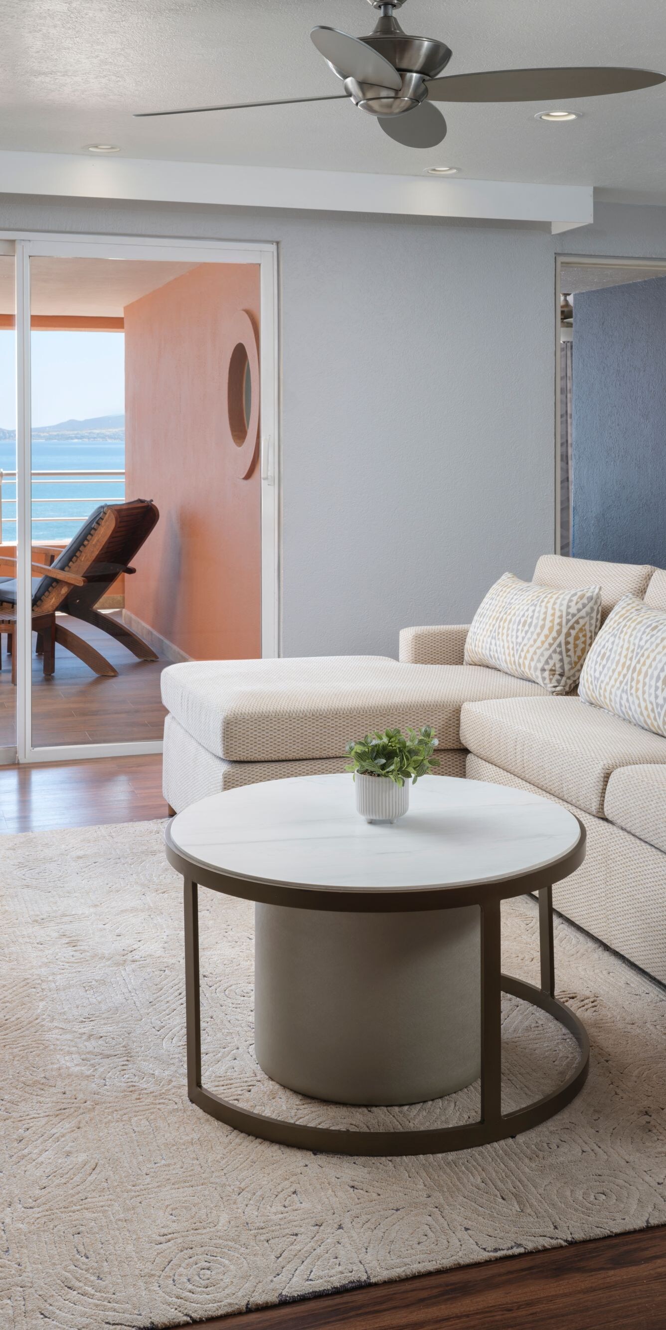 sofa, coffee table, chair, tv, ocean view balcony
