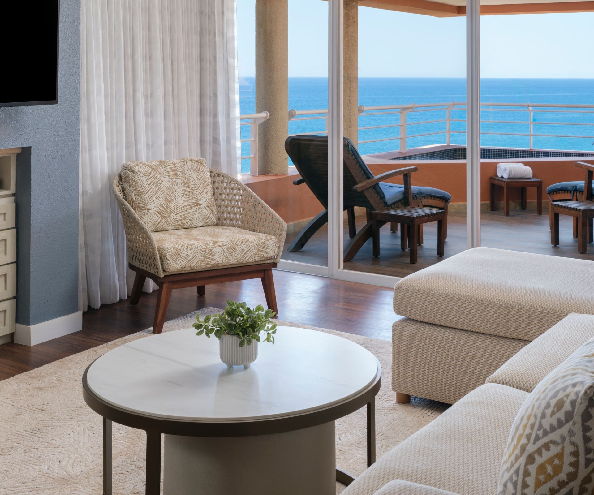 Living room suite with ocean view balcony seating