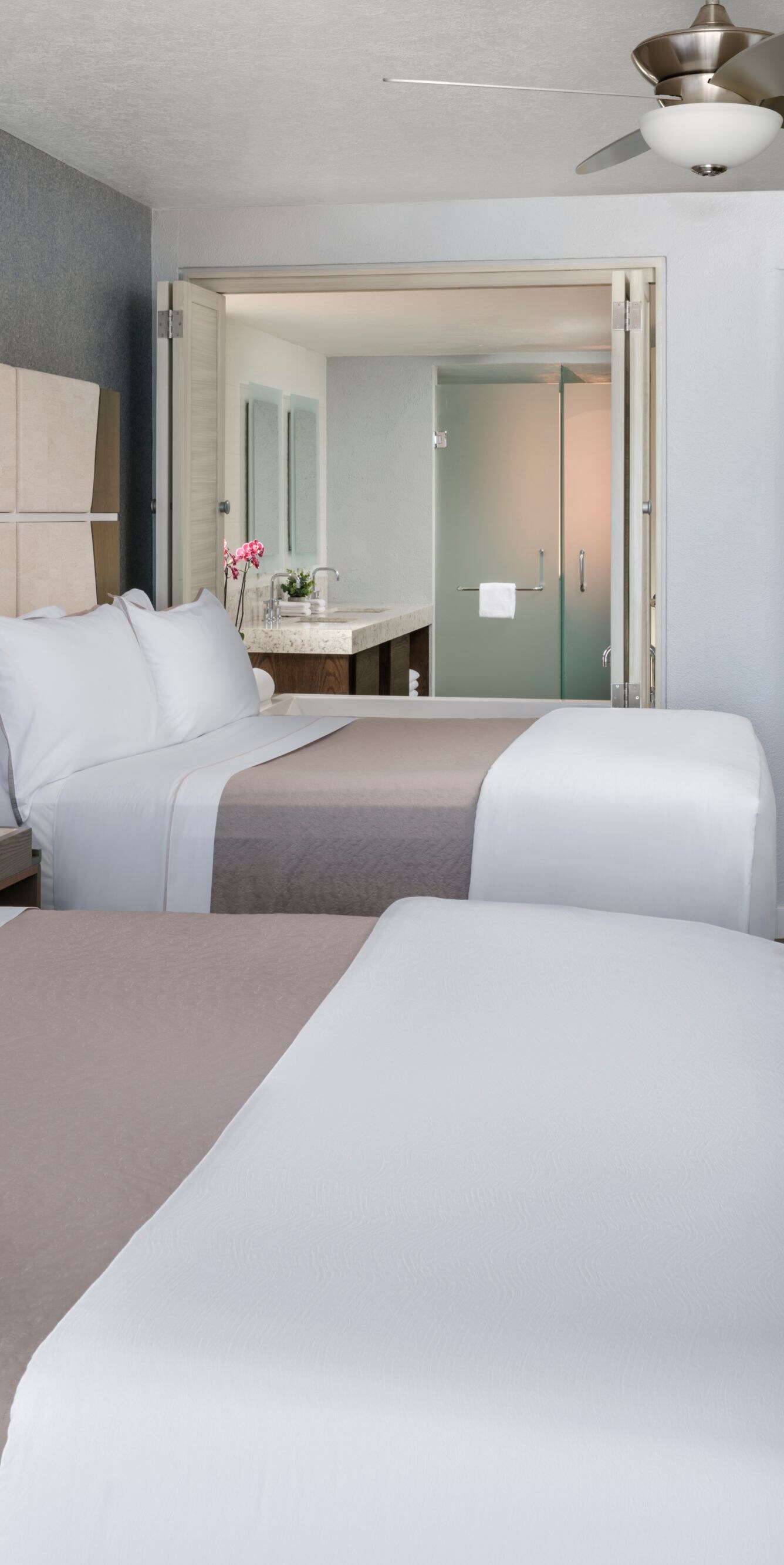 Two queen beds and bathroom