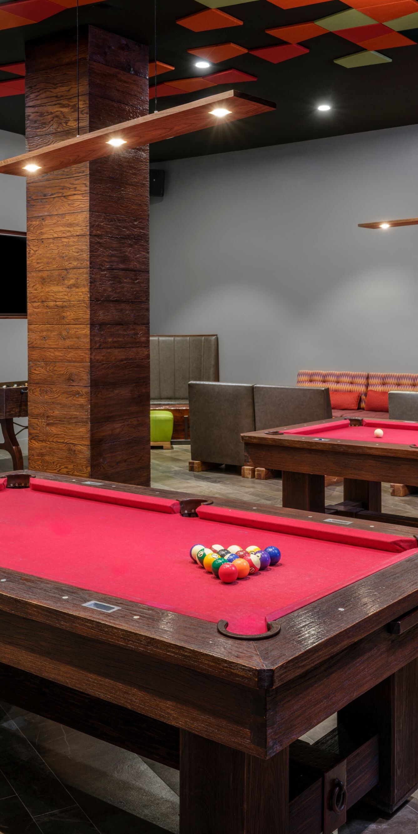 Restaurant with billiards, foosball, seating area