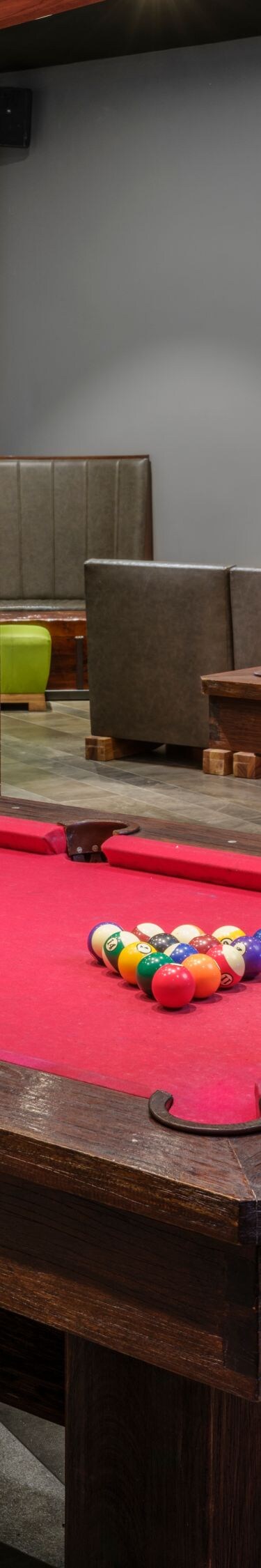 Restaurant with billiards, foosball, seating area