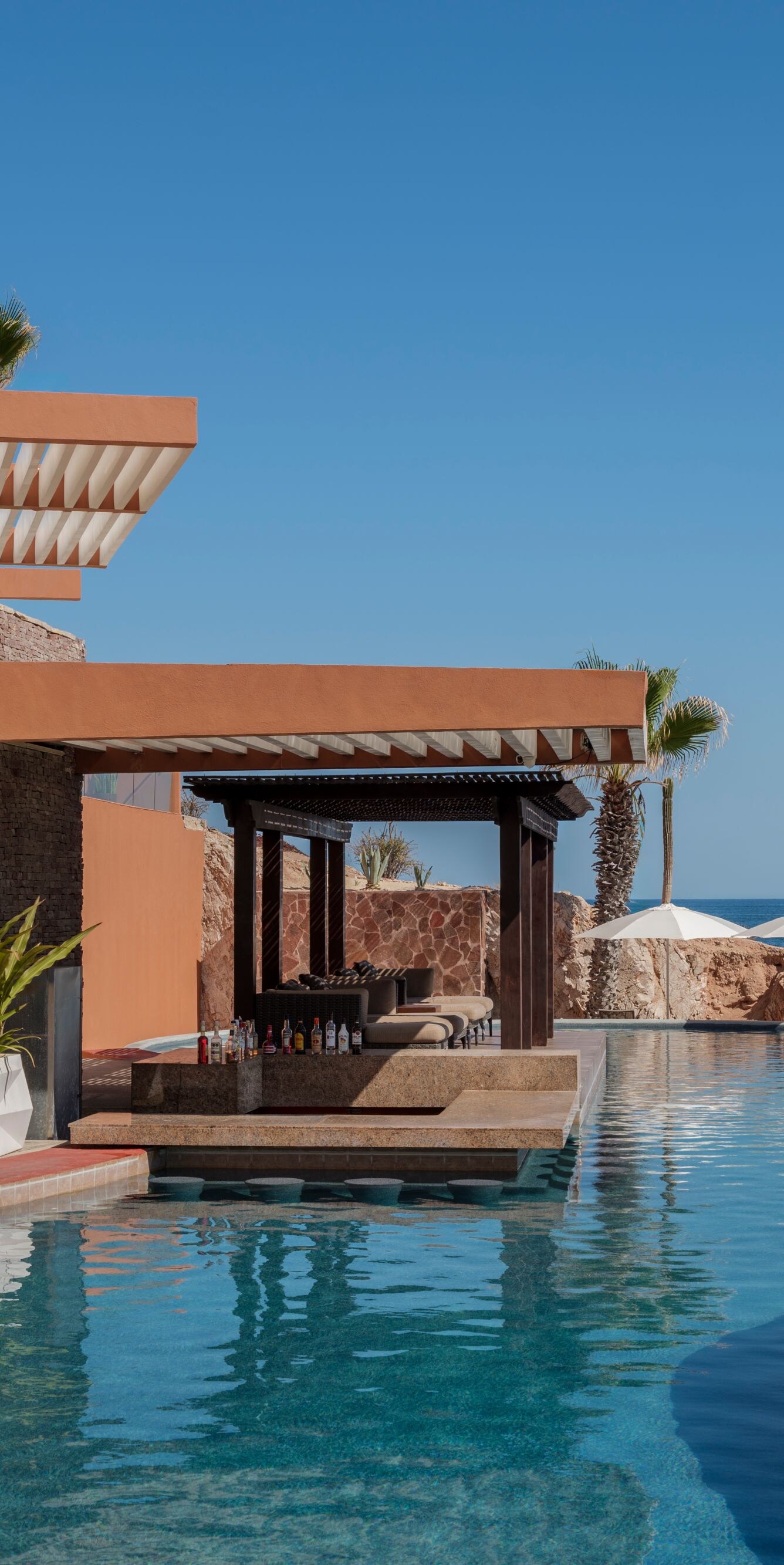 Oceanfront resort pool bar in Los Cabos
