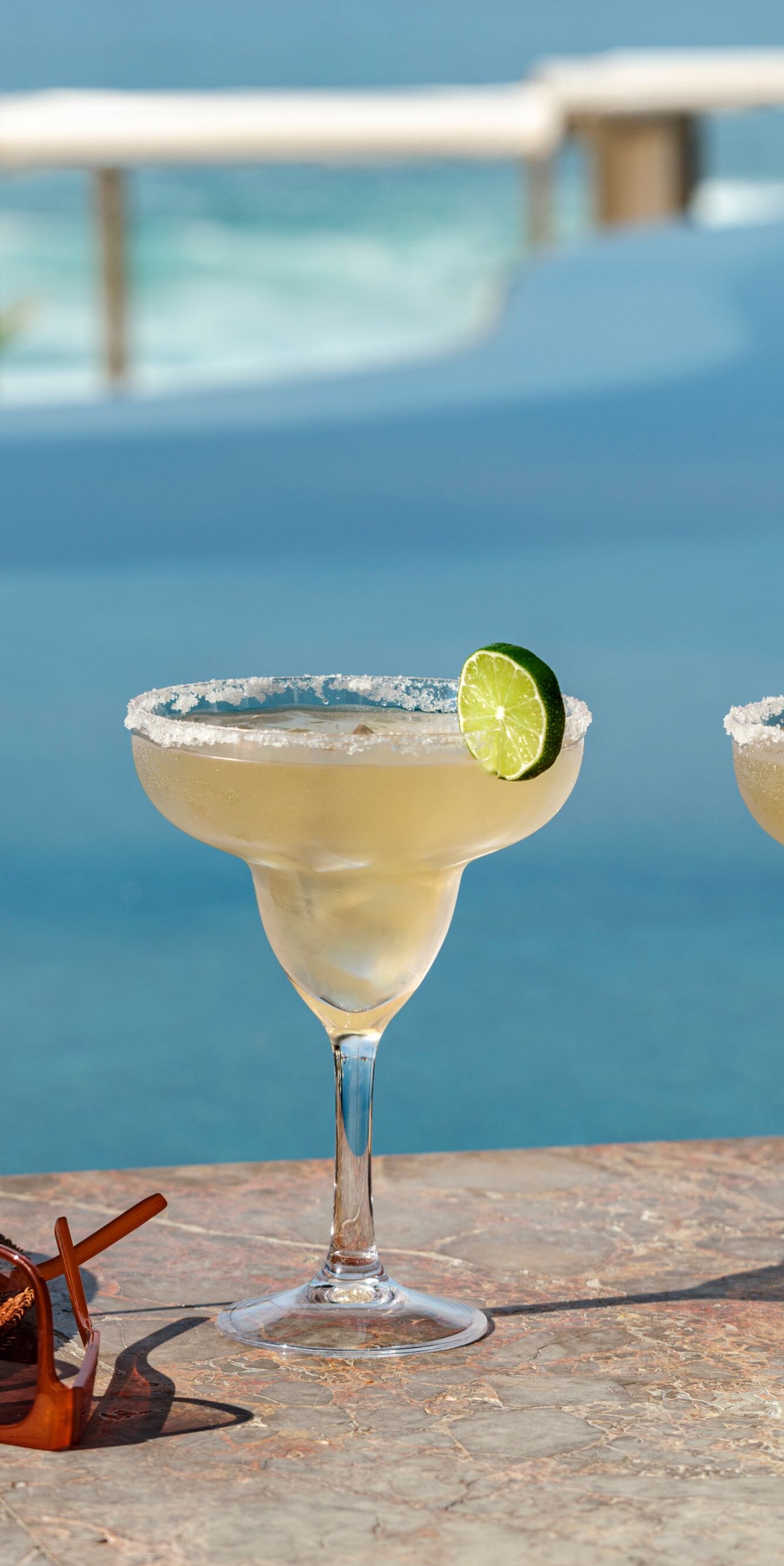 Margarita drinks at beachfront pool bar