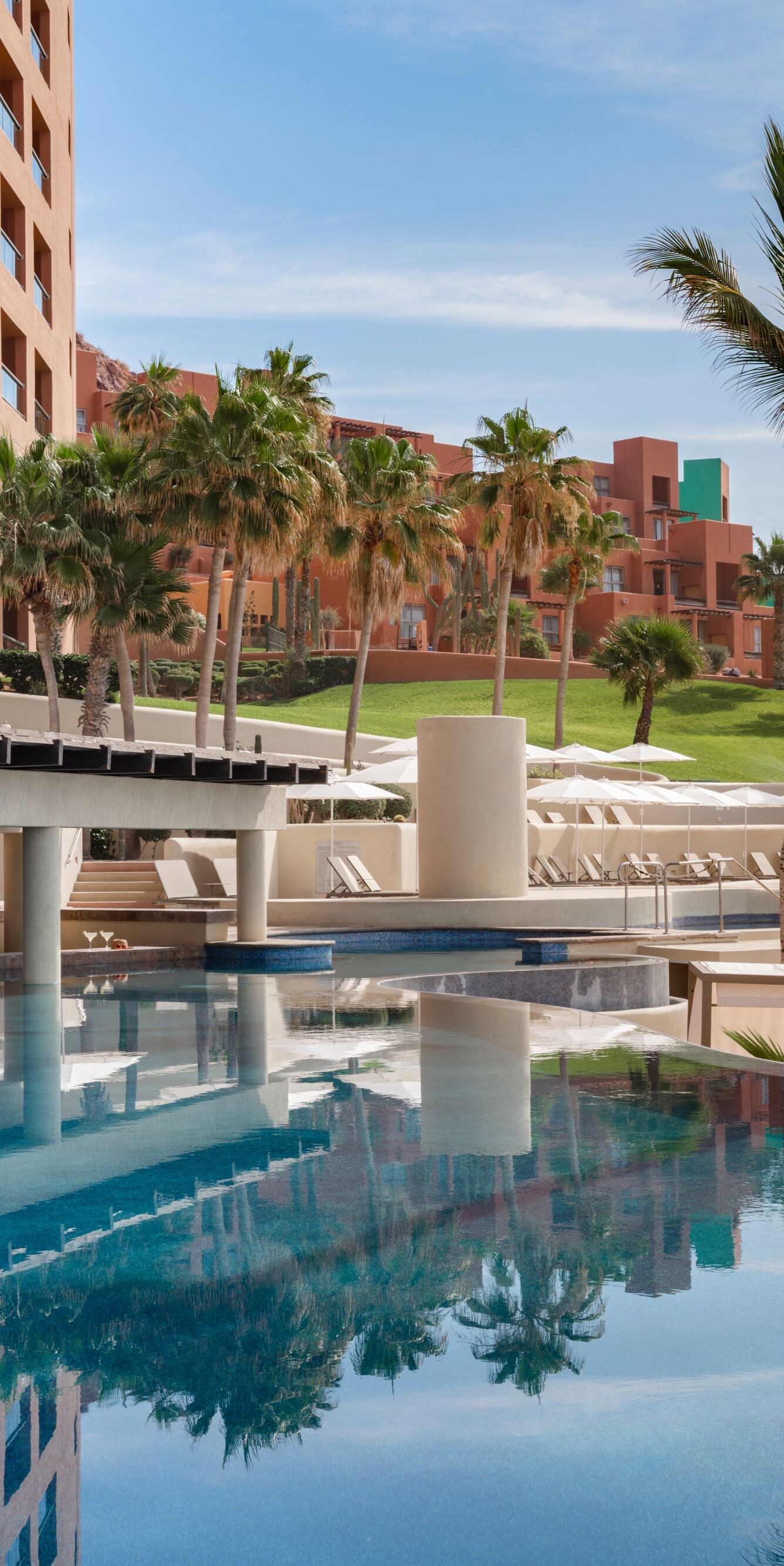 Beachfront resort pool with swim-up bar