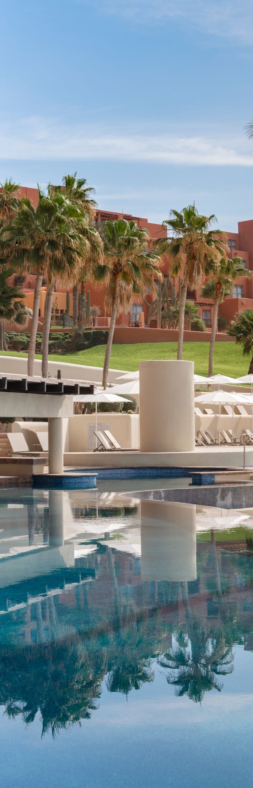 Beachfront resort pool with swim-up bar