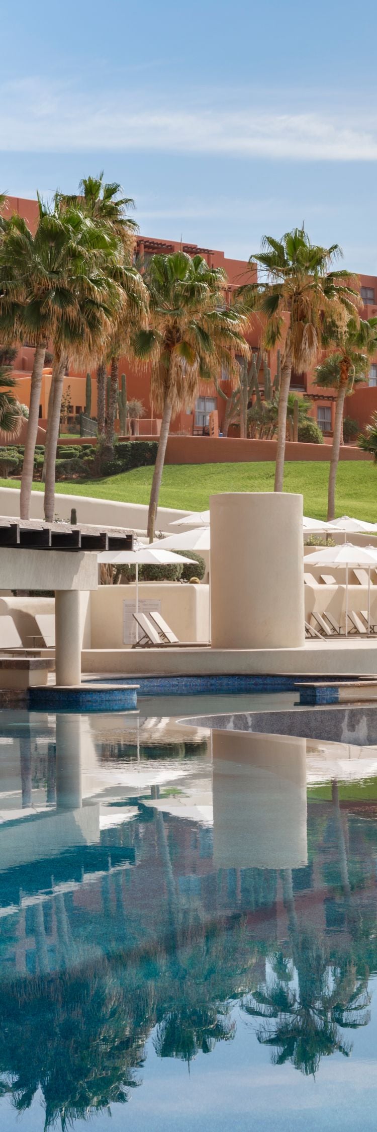 Beachfront resort pool with swim-up bar