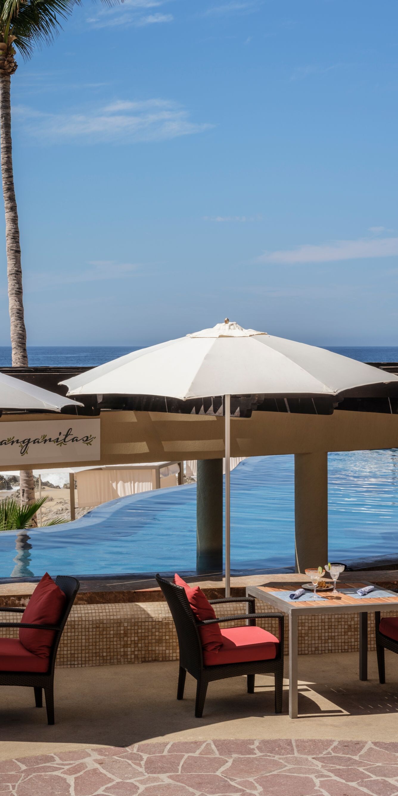 Oceanfront pool bar and seating area