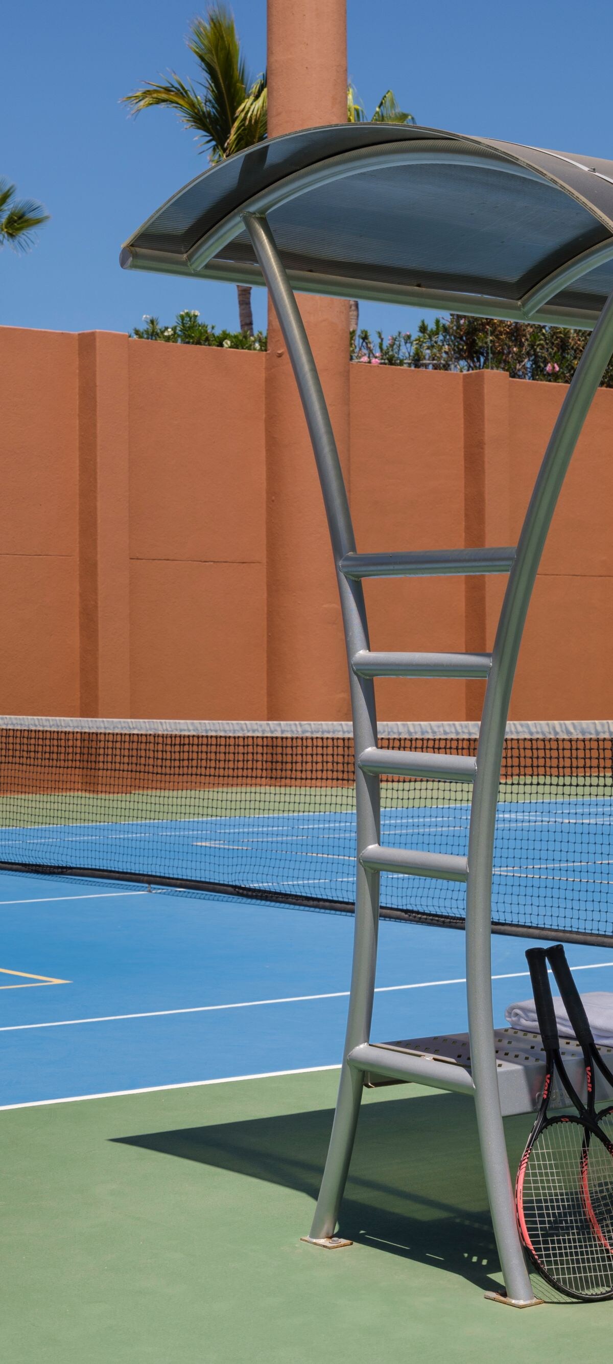 Outdoor court with tennis racquets