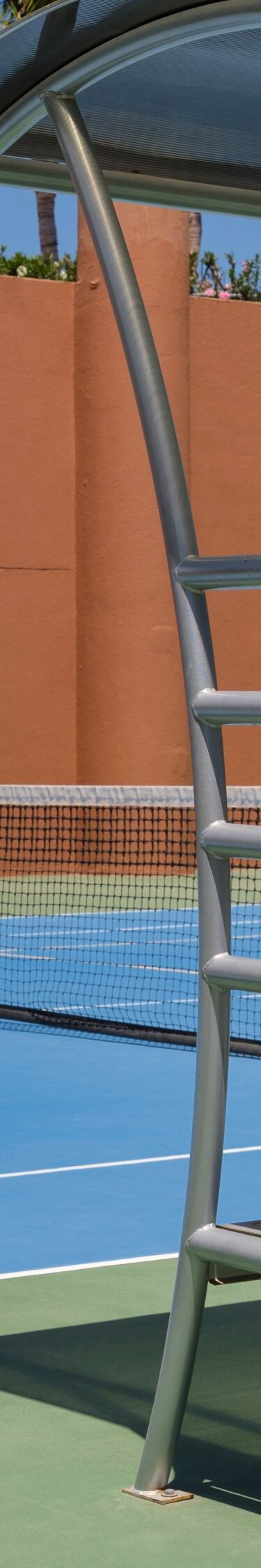 Outdoor court with tennis racquets