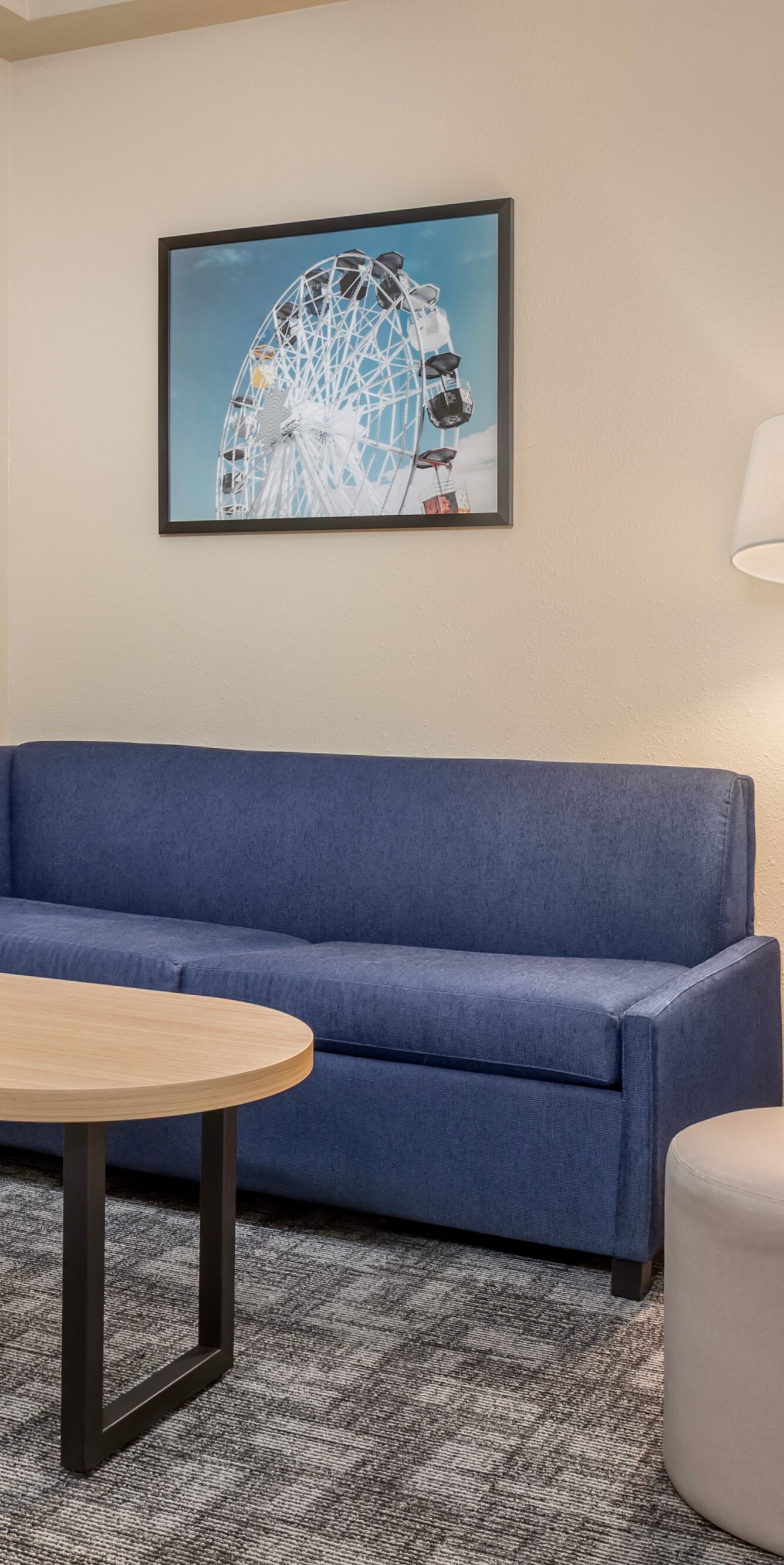 King Guest Room Entertainment Area with Sofa Bed