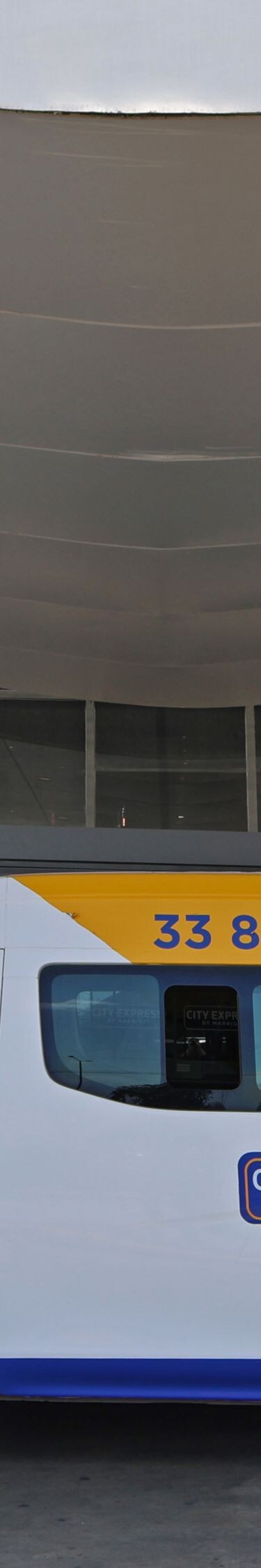 shuttle van parked at hotel entrance