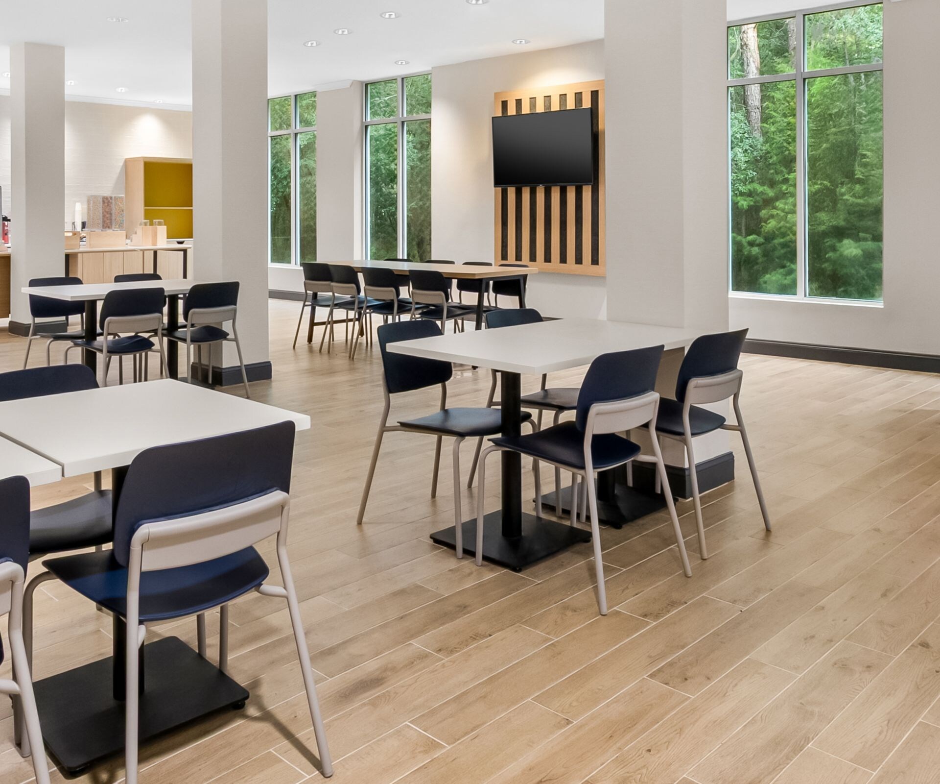 Breakfast seating area & complimentary breakfast.