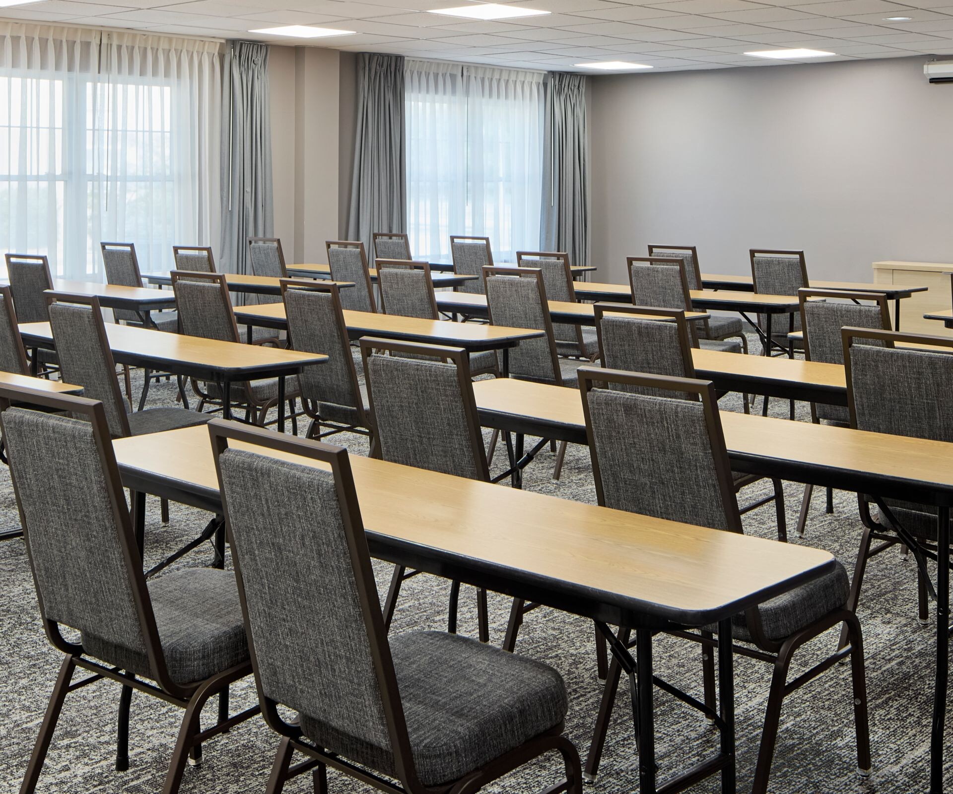 Meeting room with tables and chairs