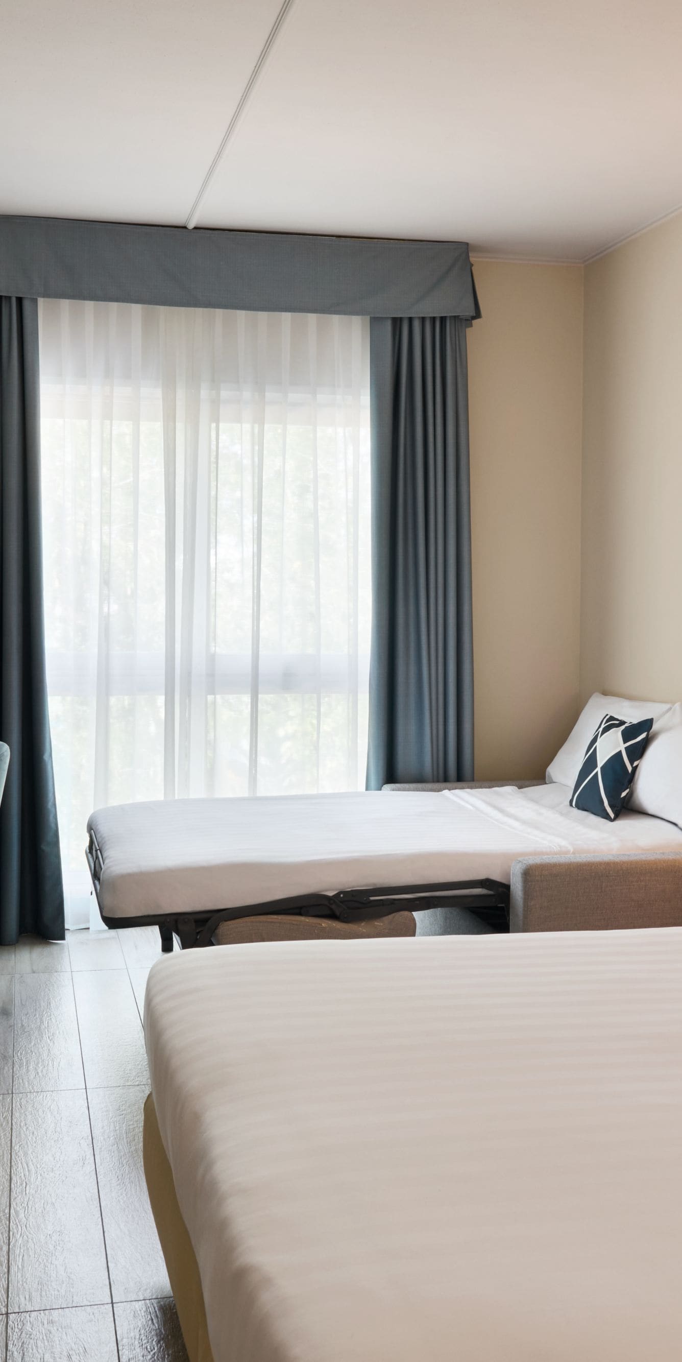 Camera con letto matrimoniale King e divano letto