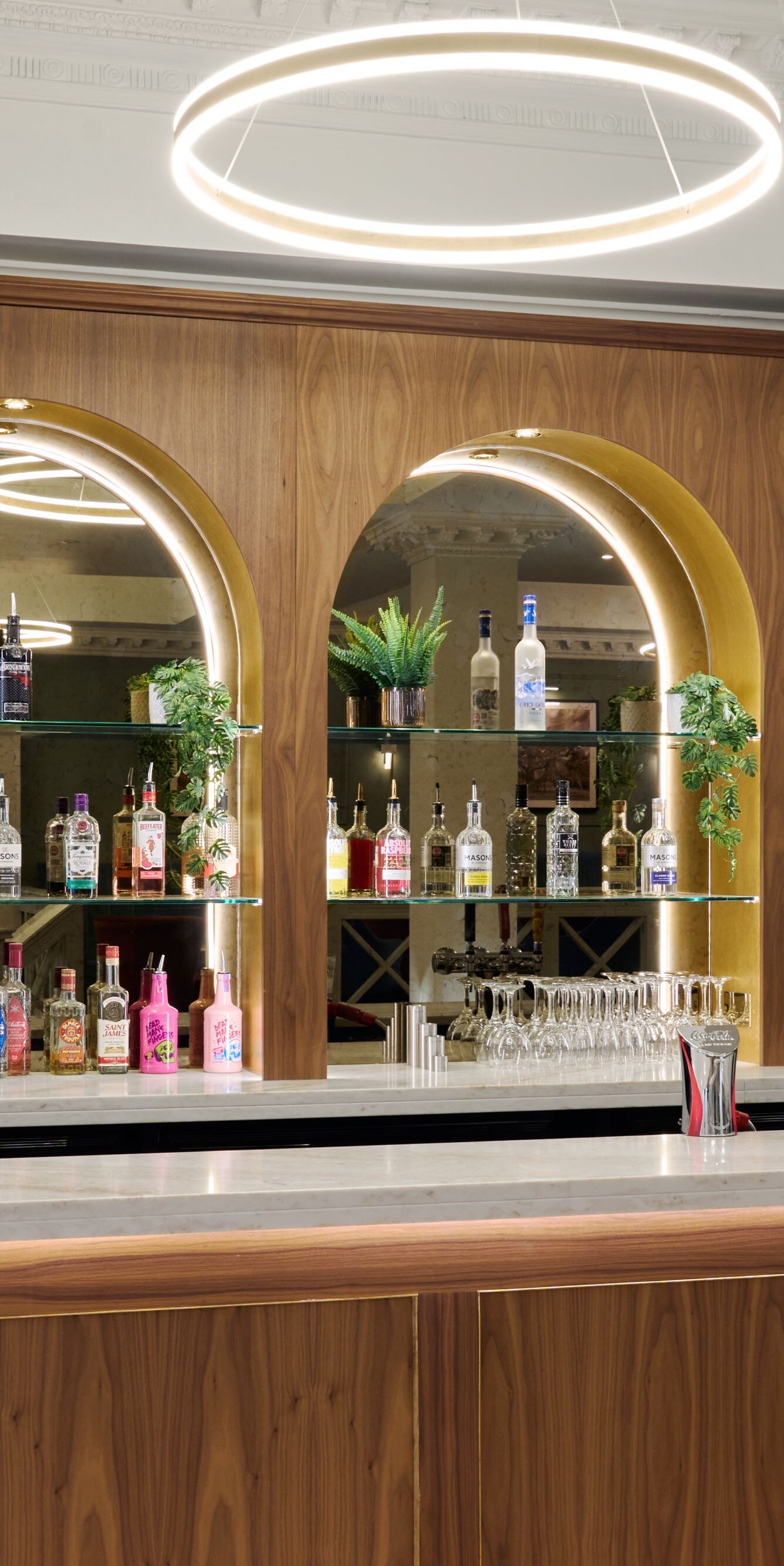 bar with spirits on shelves, post mix and draught