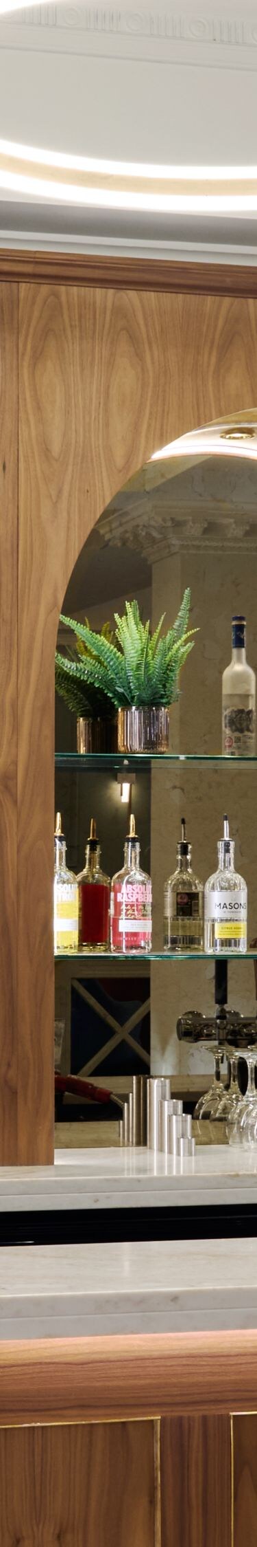 bar with spirits on shelves, post mix and draught