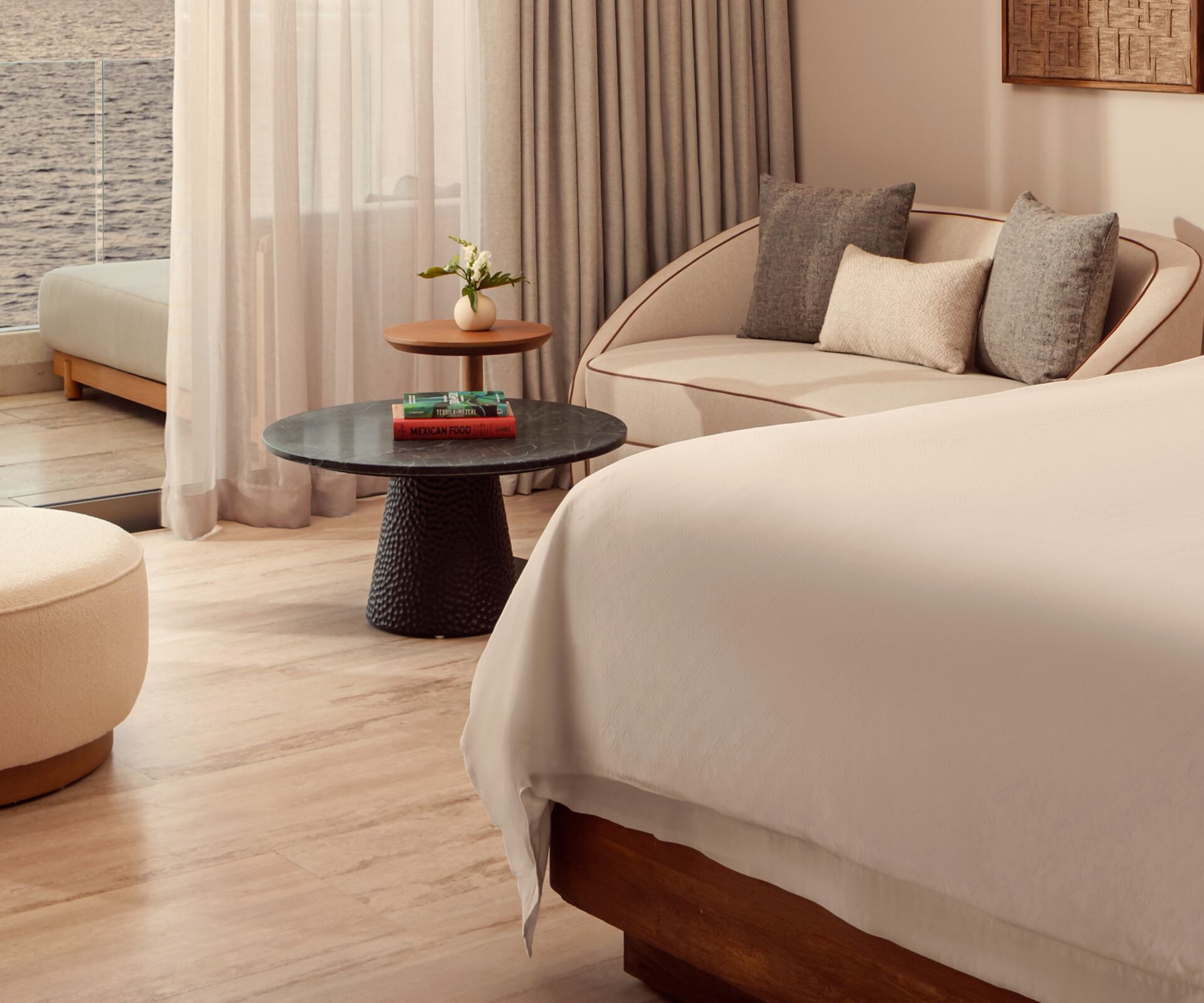 Oceanfront suite bedroom featuring a king bed