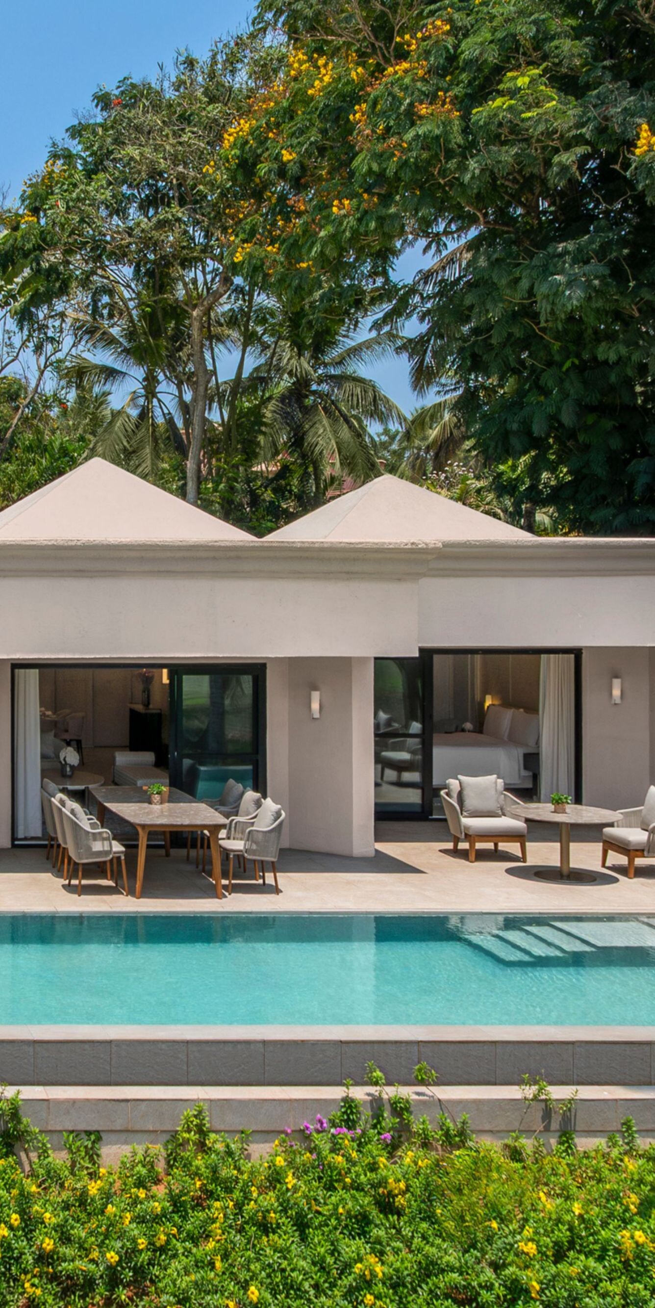 Private villa with pool, patio seating and gardens