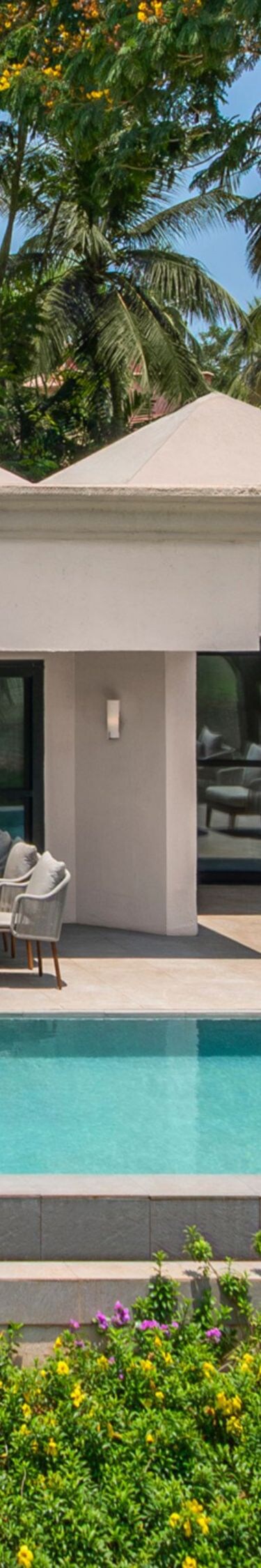 Private villa with pool, patio seating and gardens