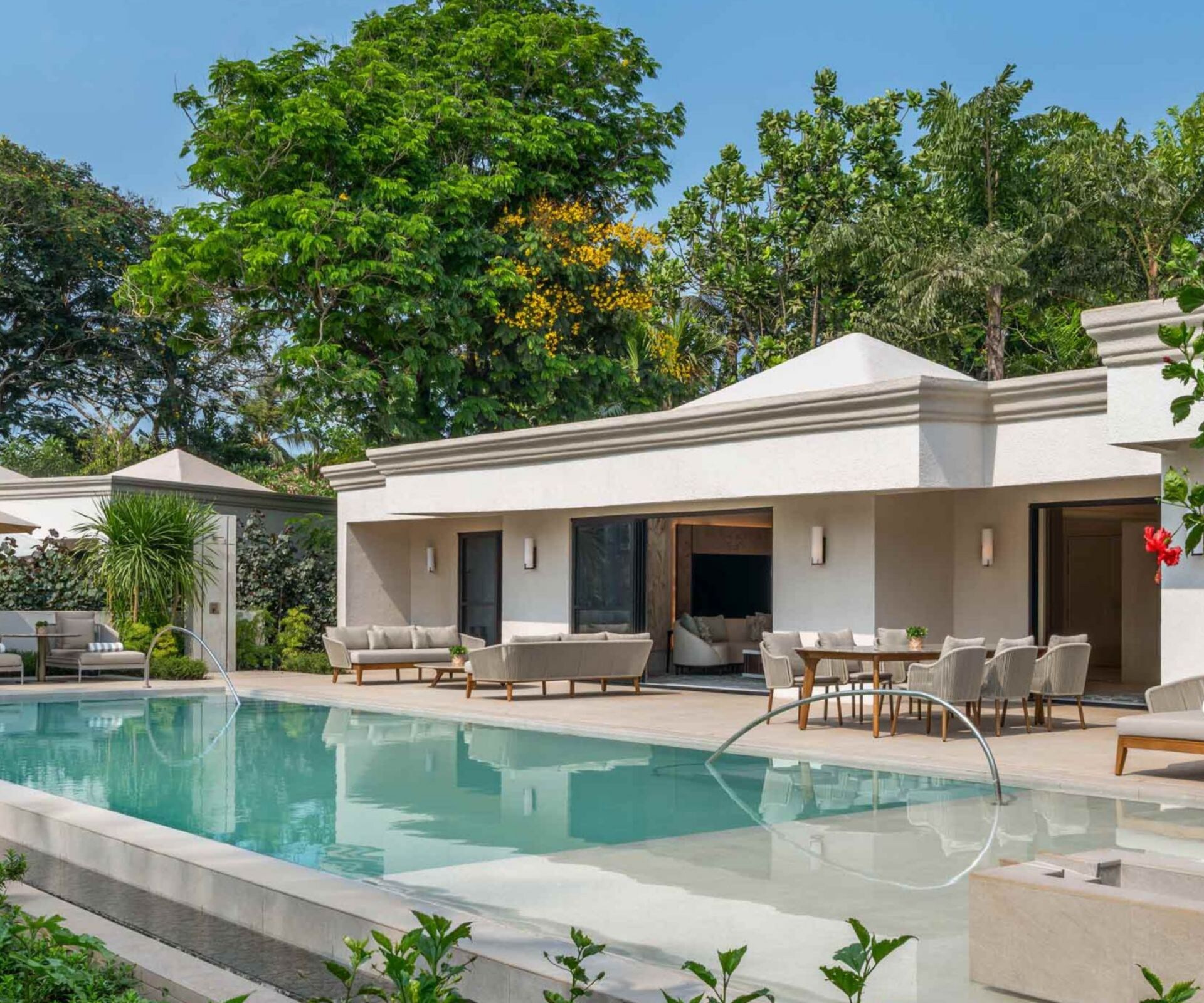 villa terrace with pool and foliage