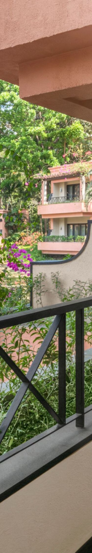 Balcony seating overlooking pond and gardens