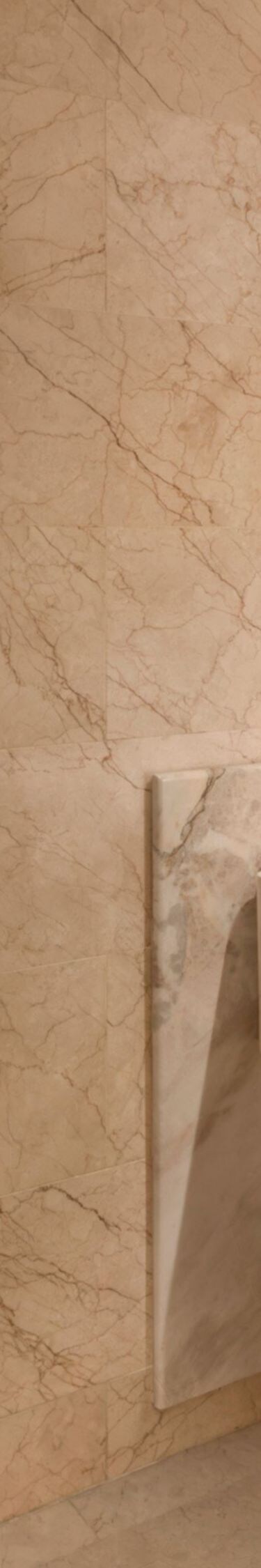 Bathroom with glass shower and marble vanity