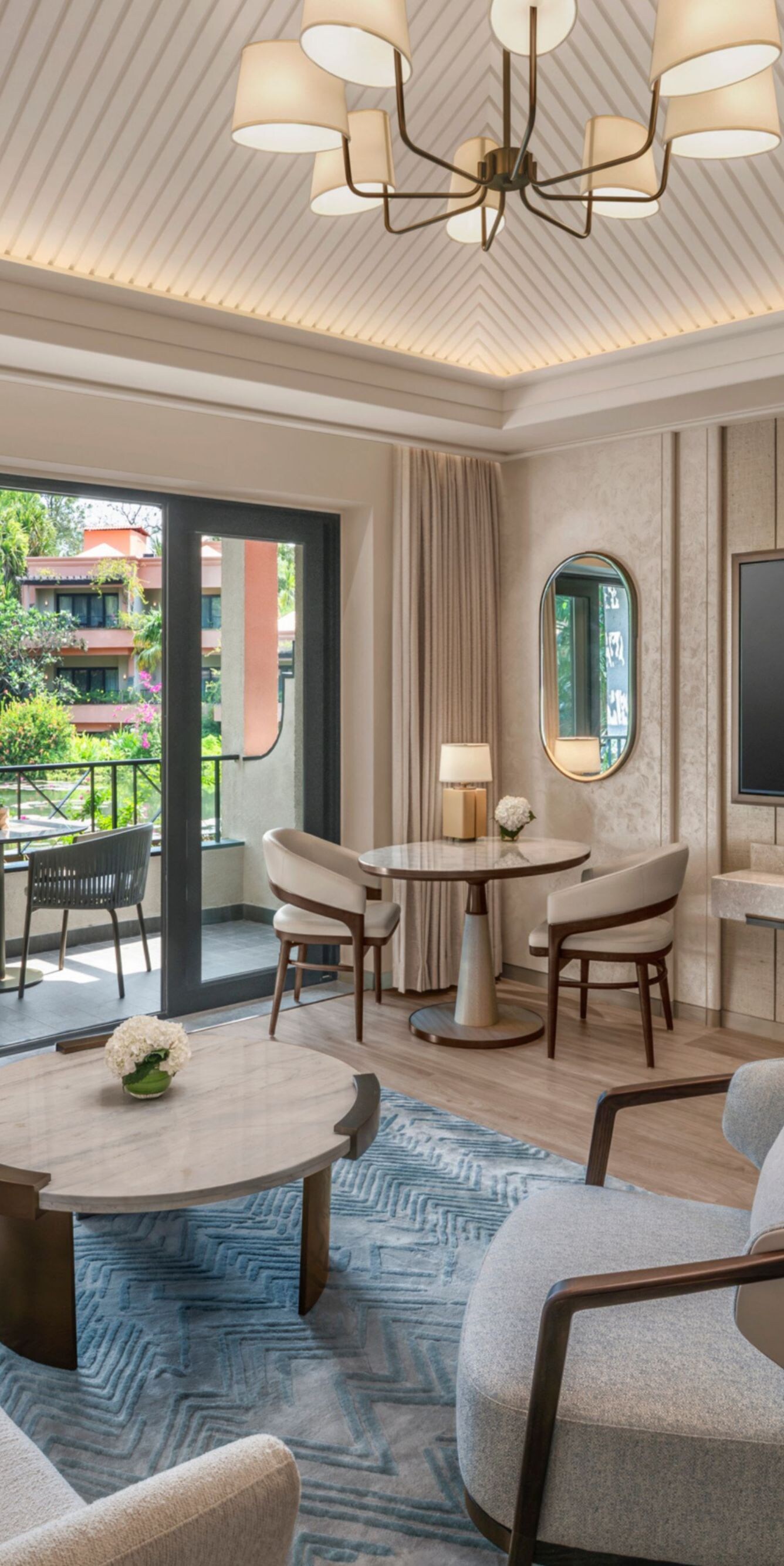 Living room with balcony seating and view