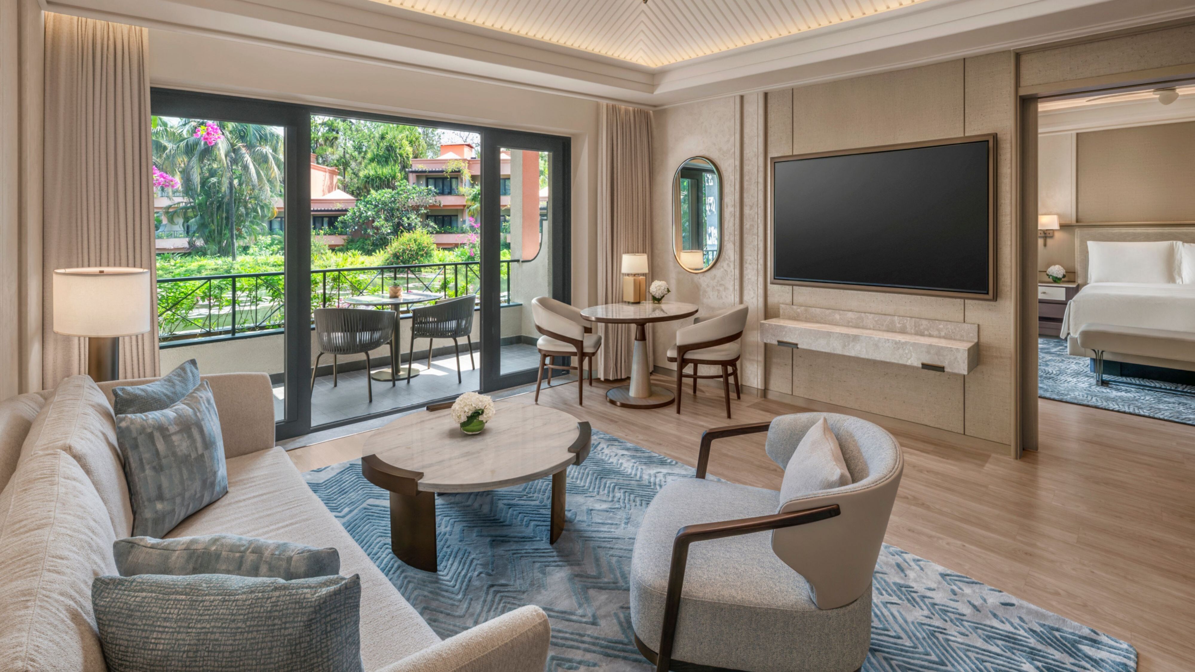 Living room with balcony seating and view