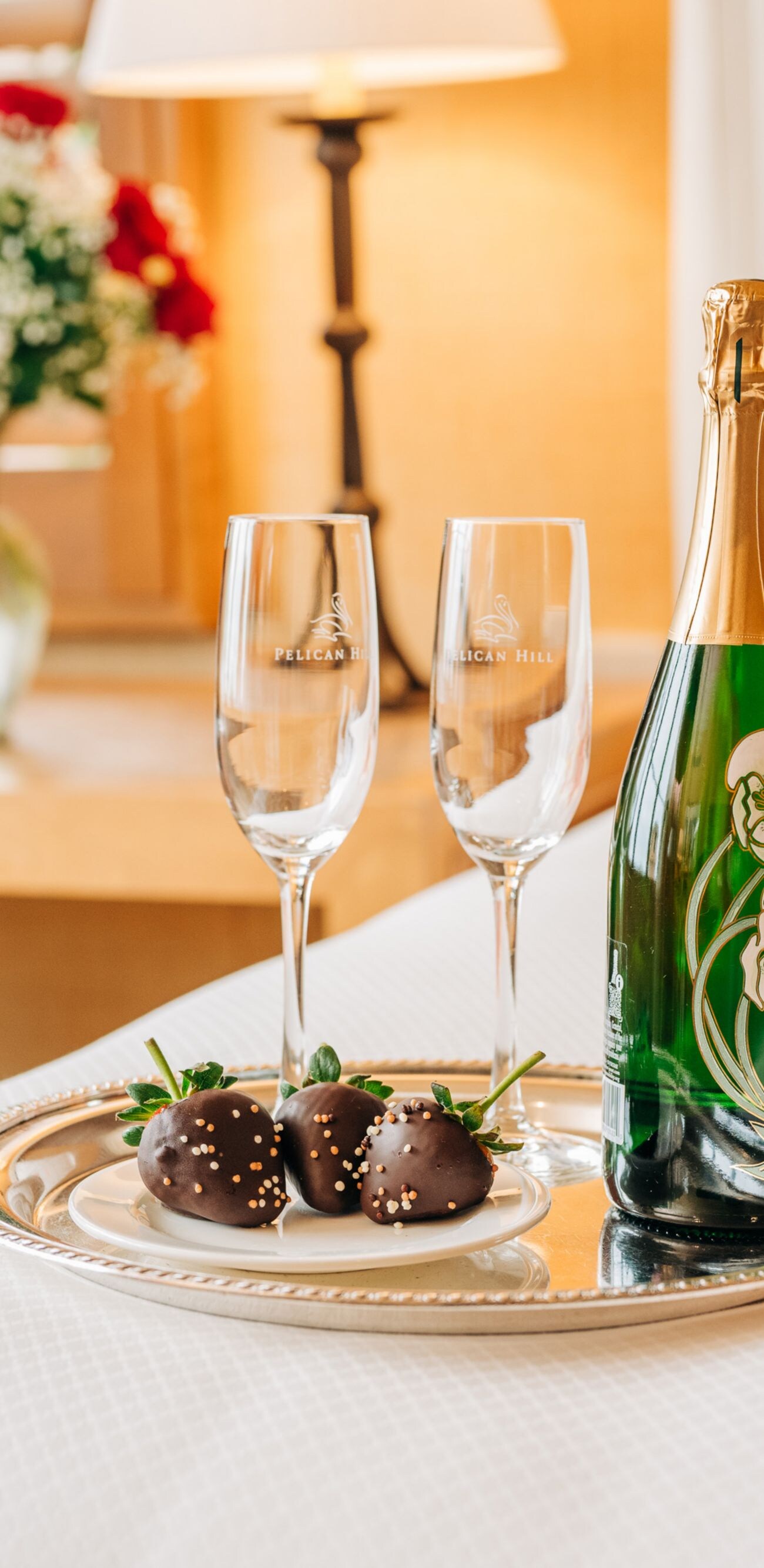 Room service champagne and chocolate strawberries