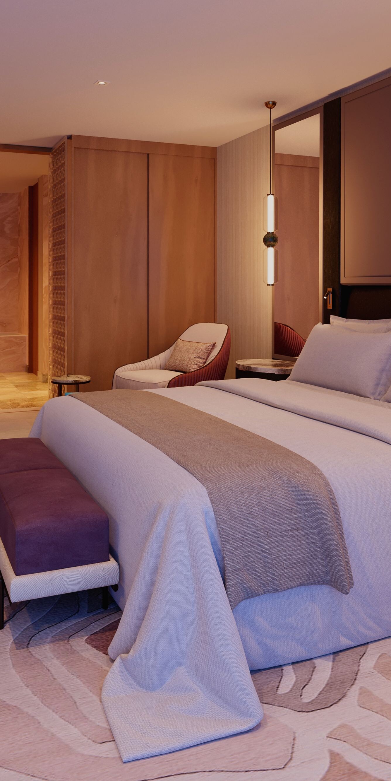 Lit dans une chambre de suite luxueuse