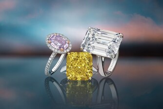 A purple ring, a yellow ring, and a white ring.