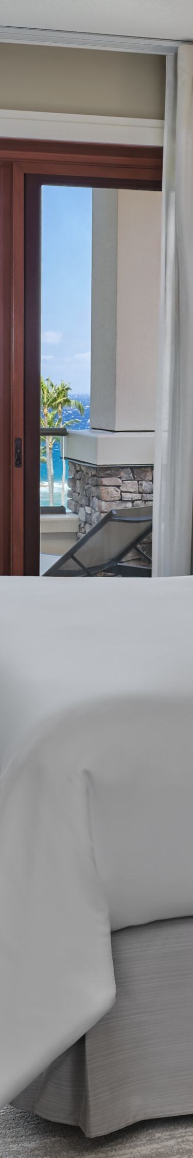 King Bedroom with ocean view lanai 