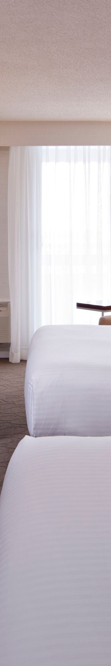 Chambre avec deux lits queen size