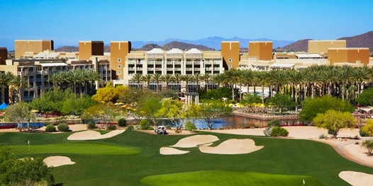 Exterior view of hotel with golf course