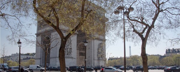 Arc de Triomphe with Eiffel Tower in background