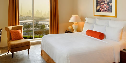 Bedroom with city skyline view