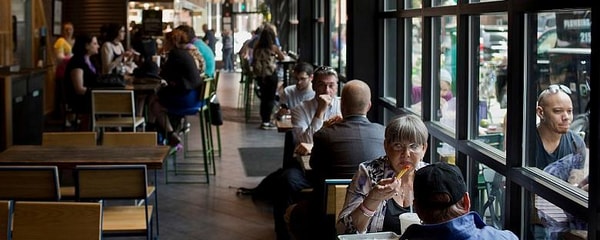 People enjoying their food at a Dallas restaurant.