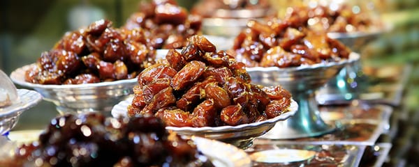 Syrupy dates are piled high for dessert in Dubai