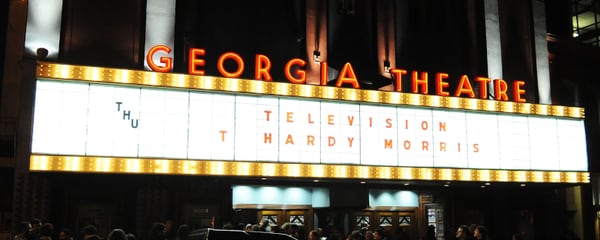 The Georgia Theatre sign lit up during a night show in Athens.