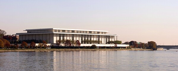 Full view of the Kennedy Center along the water in Washington, DC.