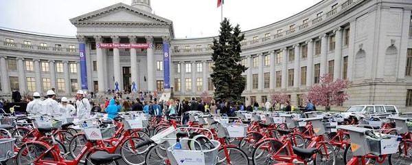 Bicycles are parked outside of the city-county building in downtown Denver, Colorado