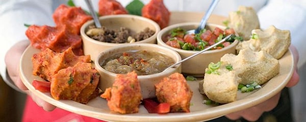 View of colorful traditional Middle Eastern food being served on a platter in Detroit.