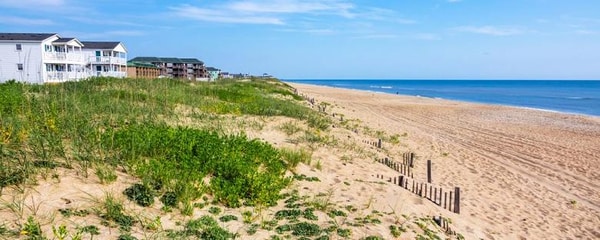 Sand dunes stretch along beach at Cape Hateras in North Carolina