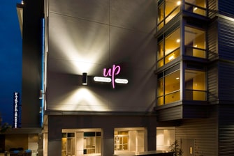 Hotel Exterior Sign for Up - A Rooftop Lounge