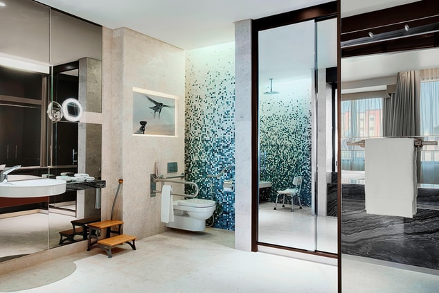 The accessible guest bathrooms are designed for comfort with ample space to move around.